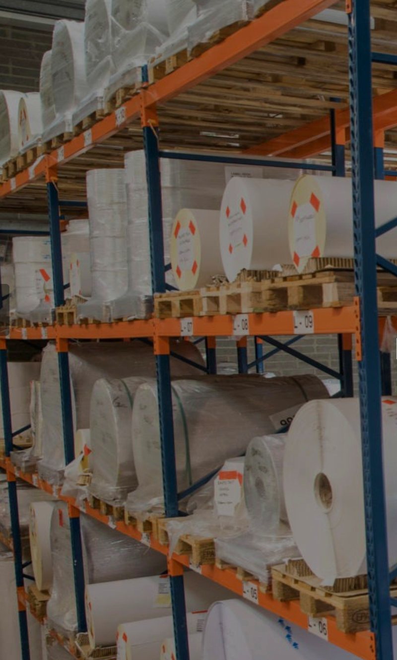 Master rolls on racking at the Platinum Paper slitting facility